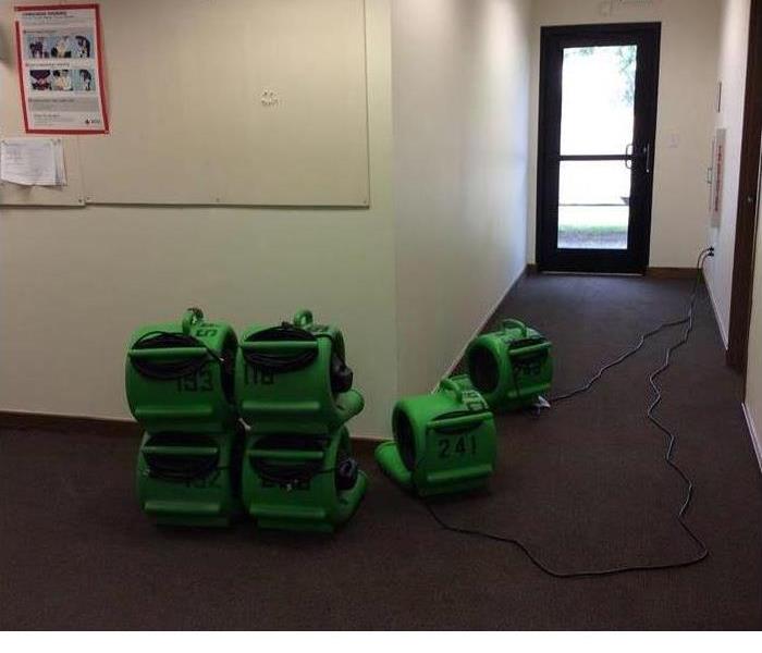 stacked equipment on a commercial carpet