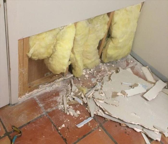 exposed insulation in a wall